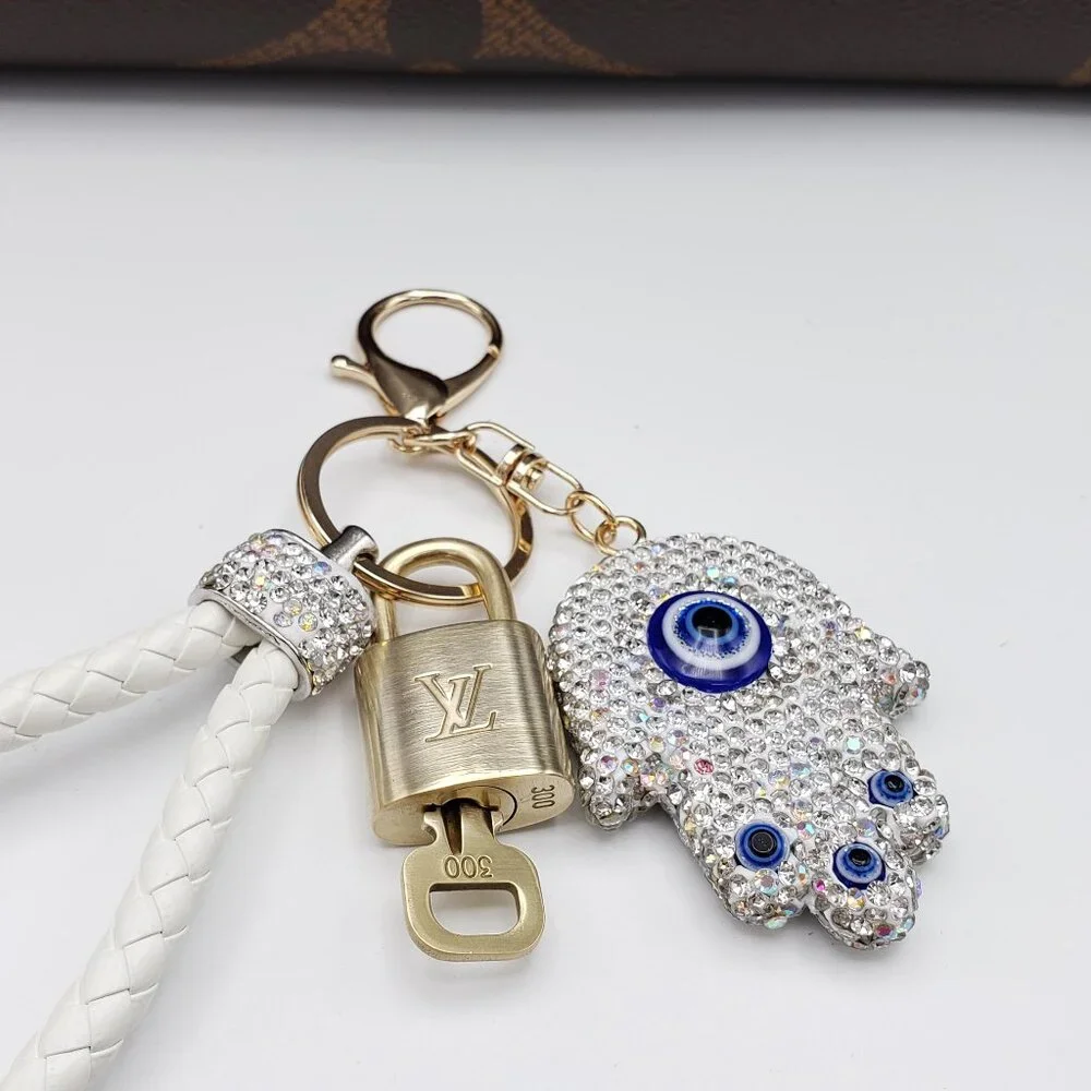 Authentic Louis Vuitton Lock & Key with unbranded Evil Eye Bagcharm
